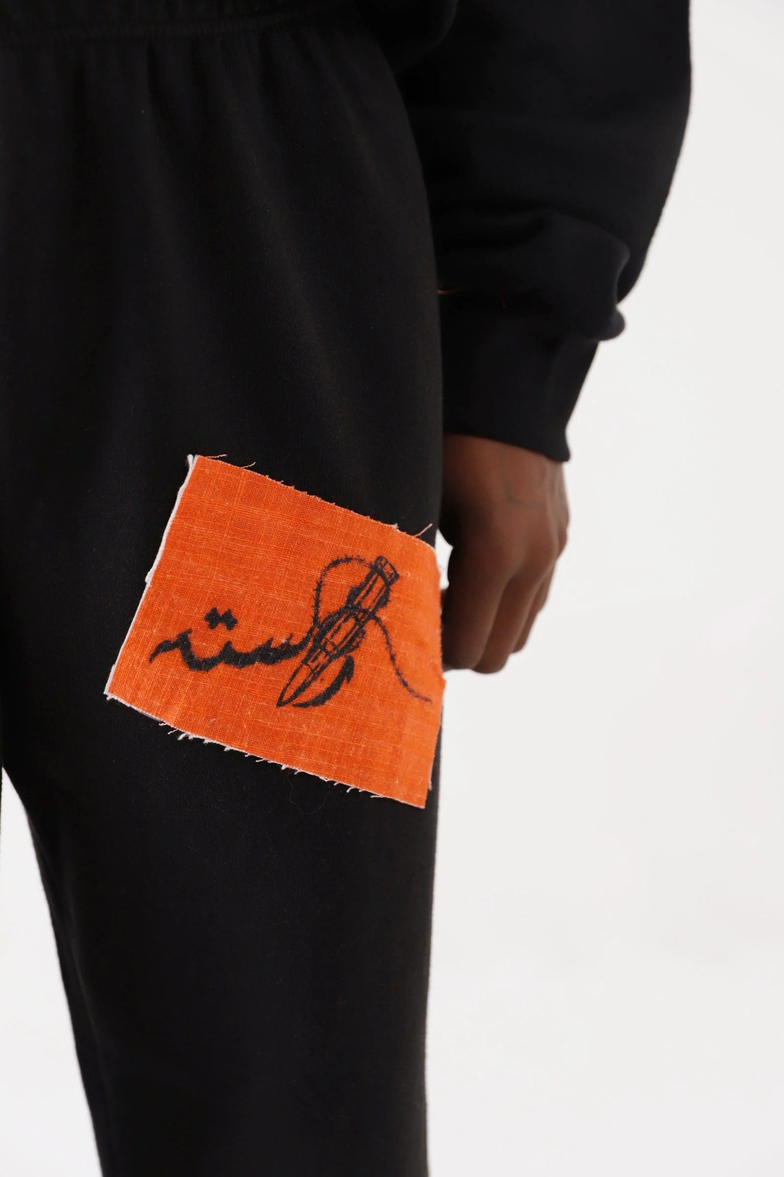 "Breath of fire" handprinted sweatpants - Image 8