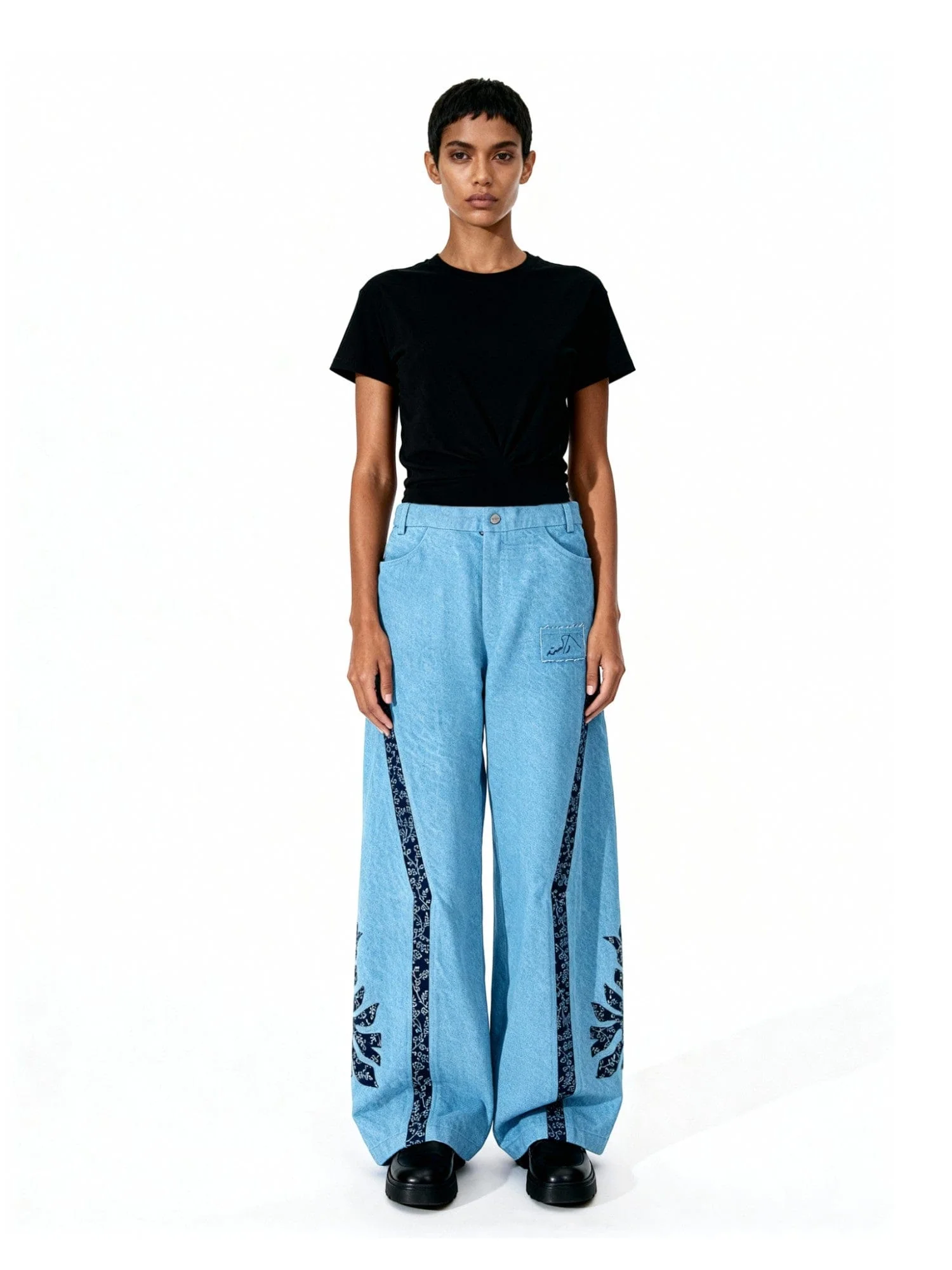 Handprinted denim trousers - Image 8